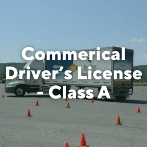 Photo of a tractor trailer with orange cones around it. Text overlay, "Commercial Driver's License-Class A."