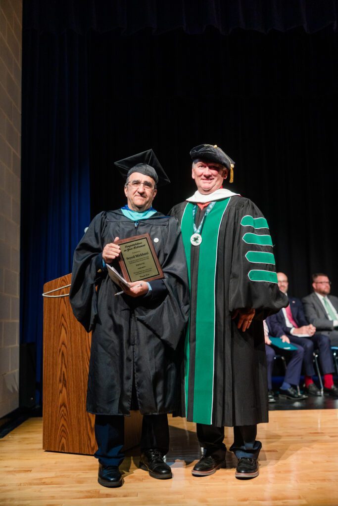 Photo of Seyed Mirkhani and Dr. Thomas Striplin.