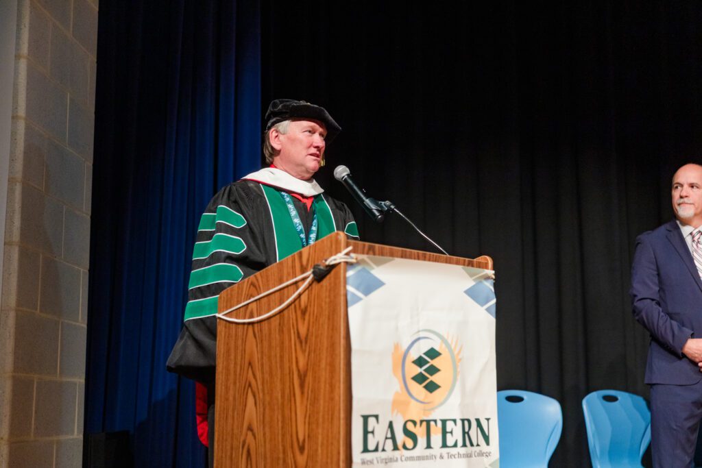 Photo of Dr. Thomas Striplin at podium.